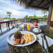 Breakfast, lunch, dinner served; ocean views