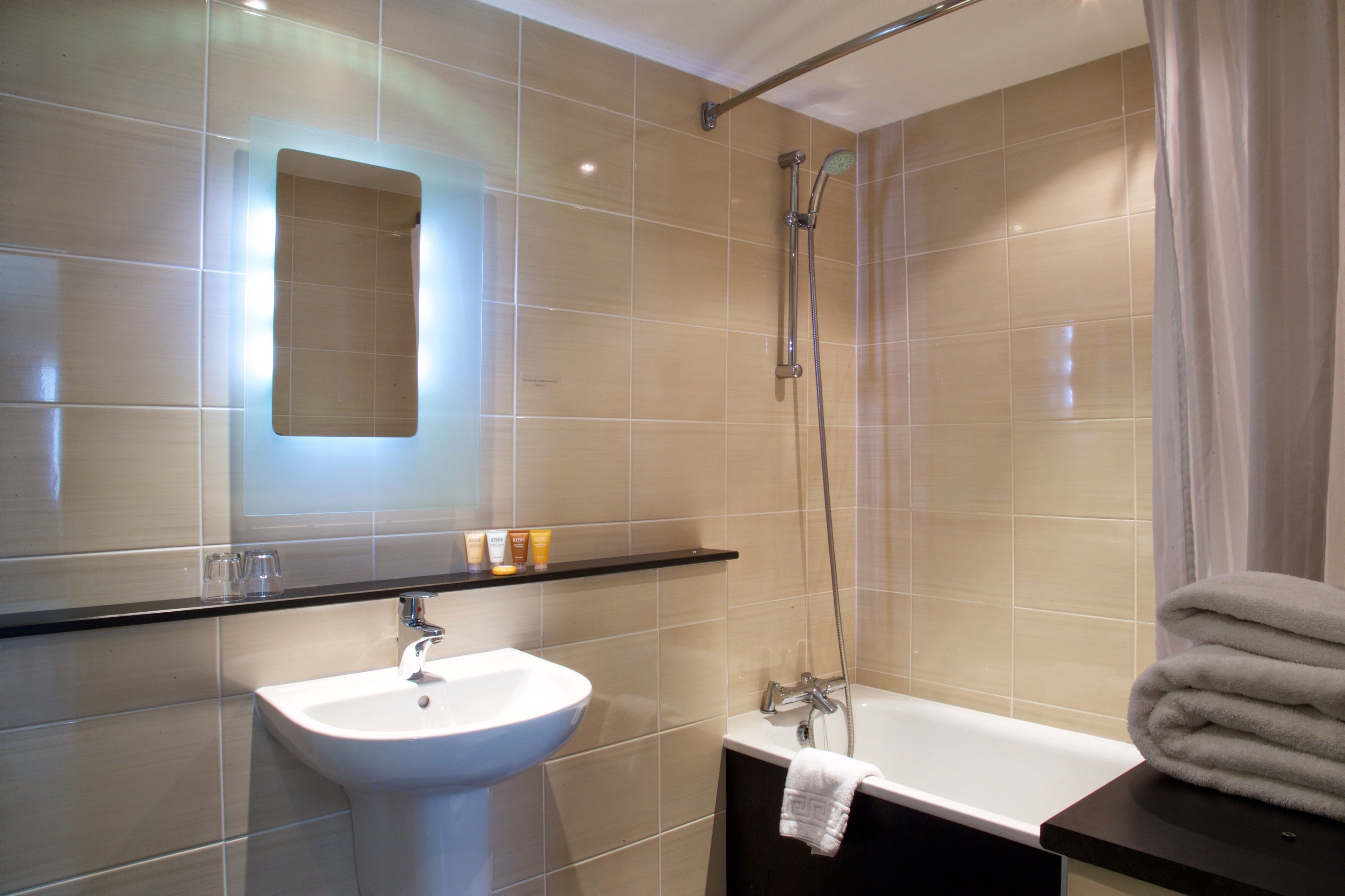 combined shower/bathtub, free toiletries, hair dryer, towels