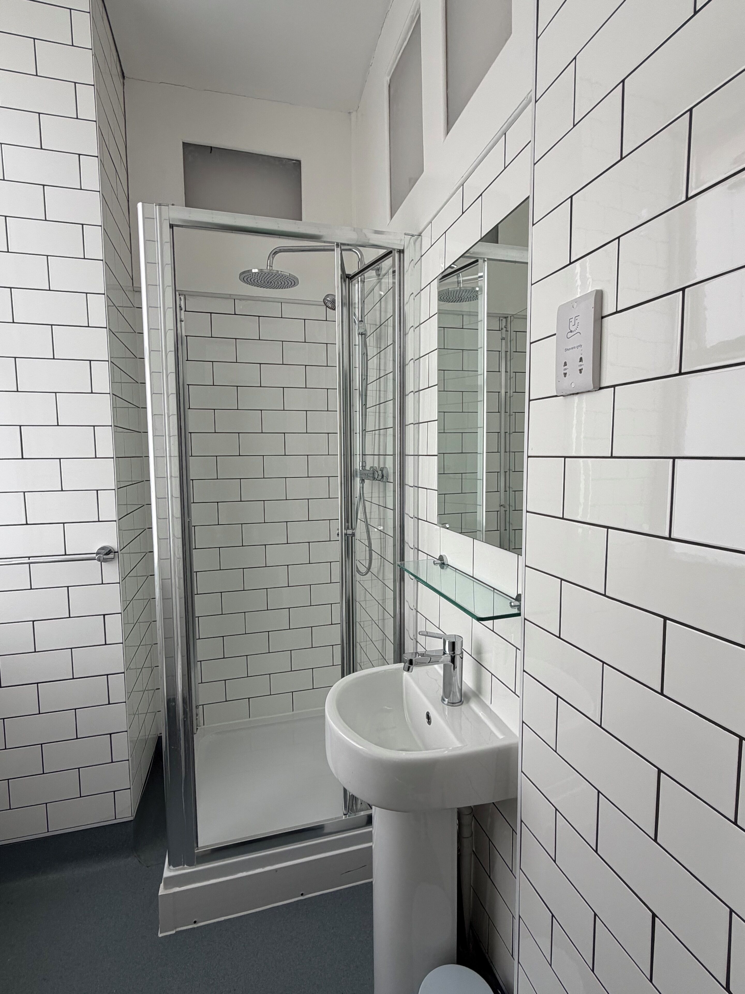 Rainfall showerhead, free toiletries, hair dryer, towels