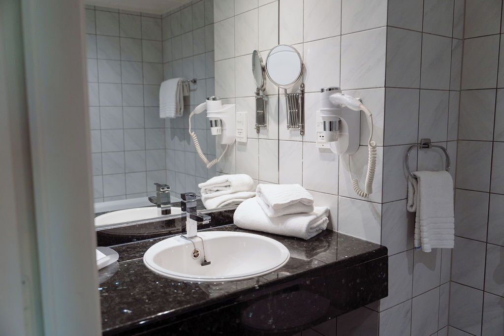 single room | bathroom | hair dryer, towels