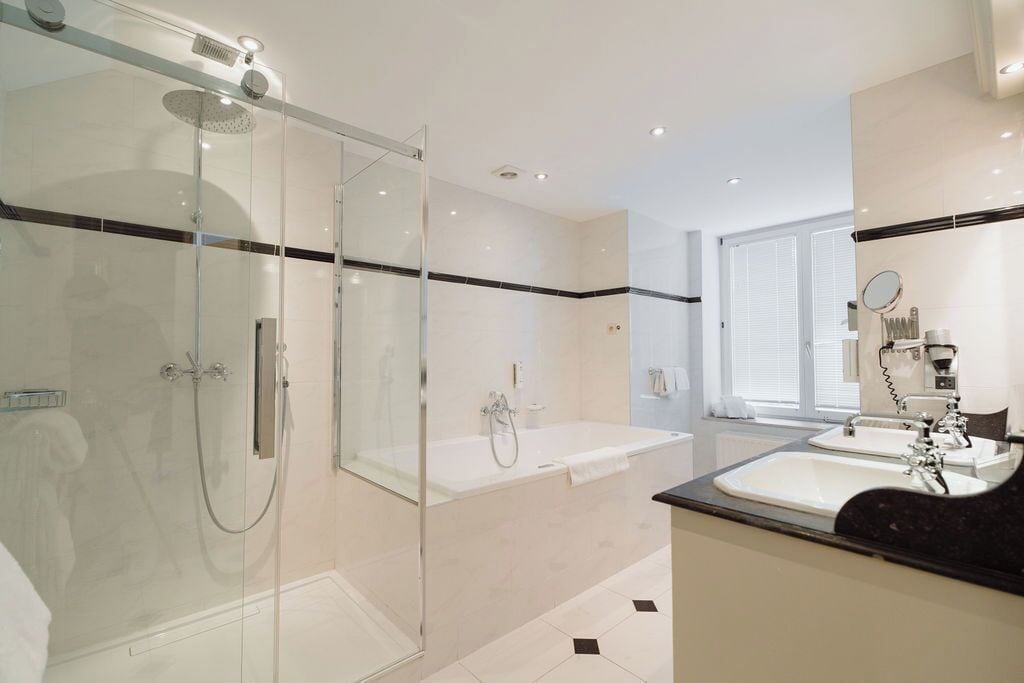 junior suite | bathroom | hair dryer, towels