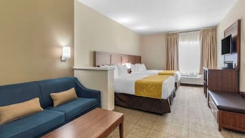Deluxe Suite, 2 Queen Beds, Non Smoking | Desk, laptop workspace, blackout drapes, iron/ironing board