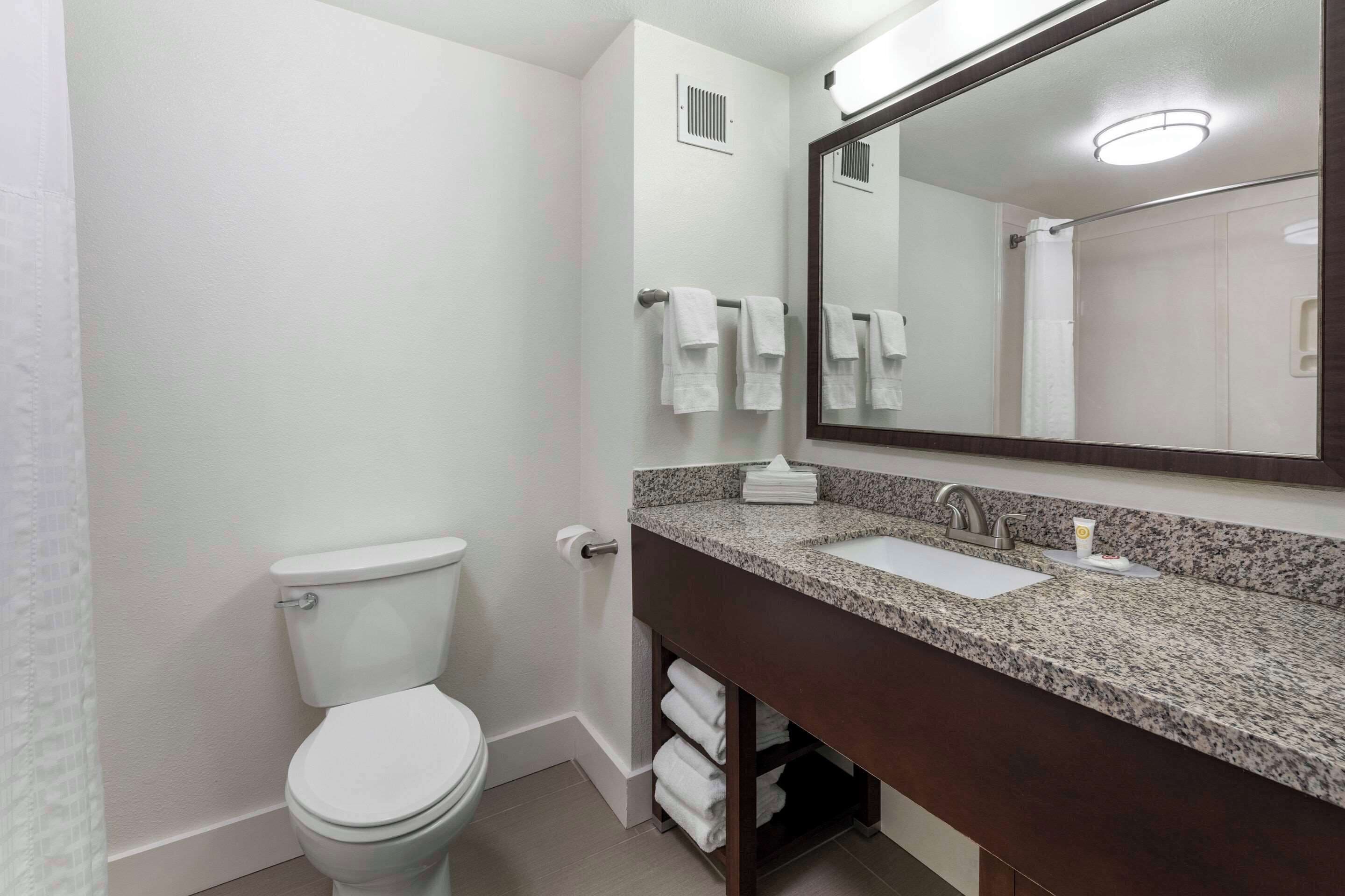 desk, laptop workspace, blackout curtains, iron/ironing board