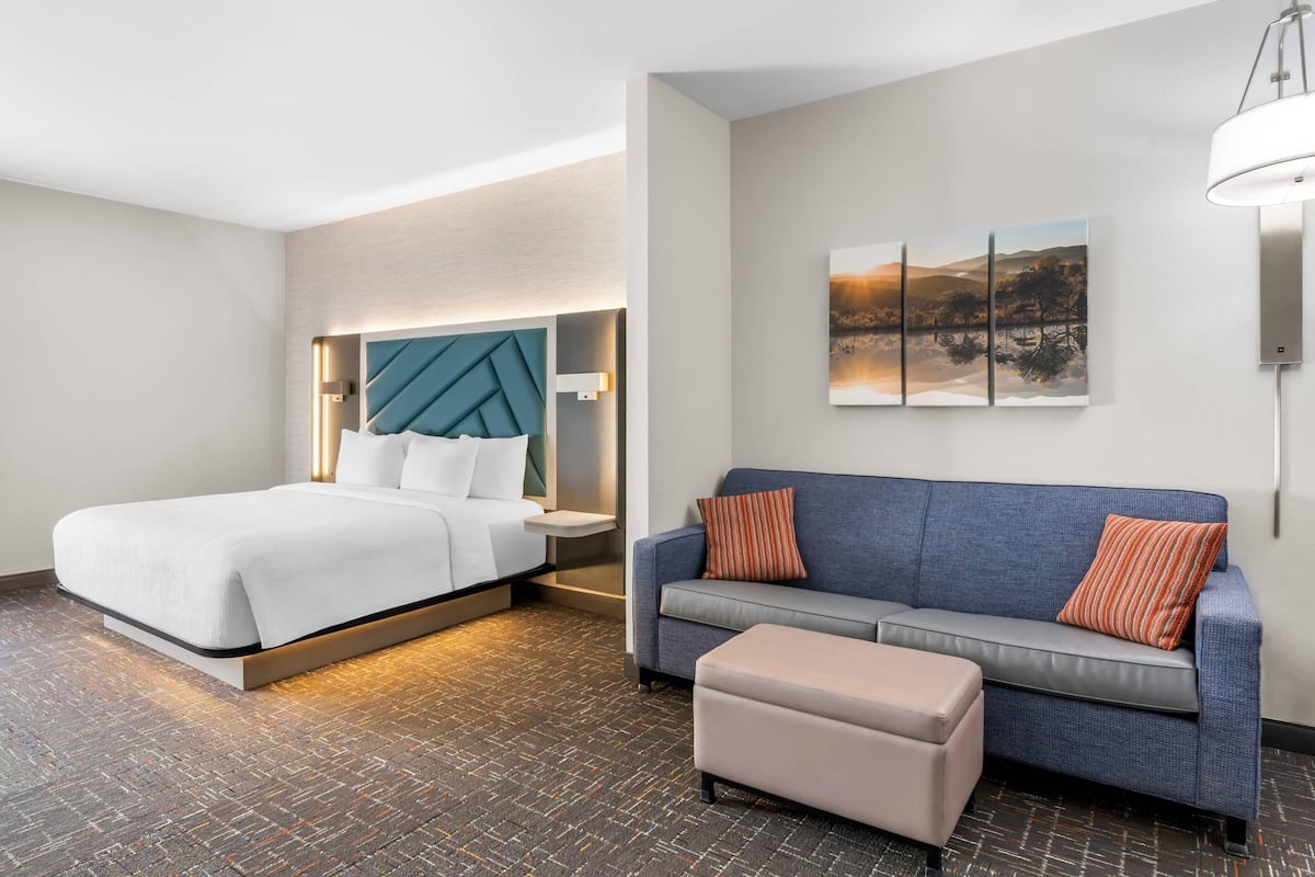 Premium bedding, pillow-top beds, desk, laptop workspace