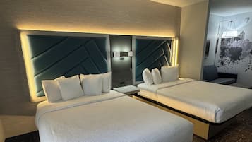 Premium bedding, pillowtop beds, desk, laptop workspace