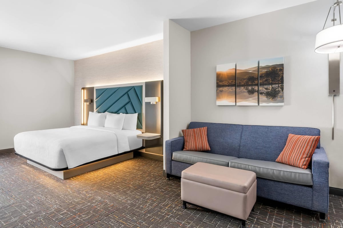 Premium bedding, pillow-top beds, desk, laptop workspace