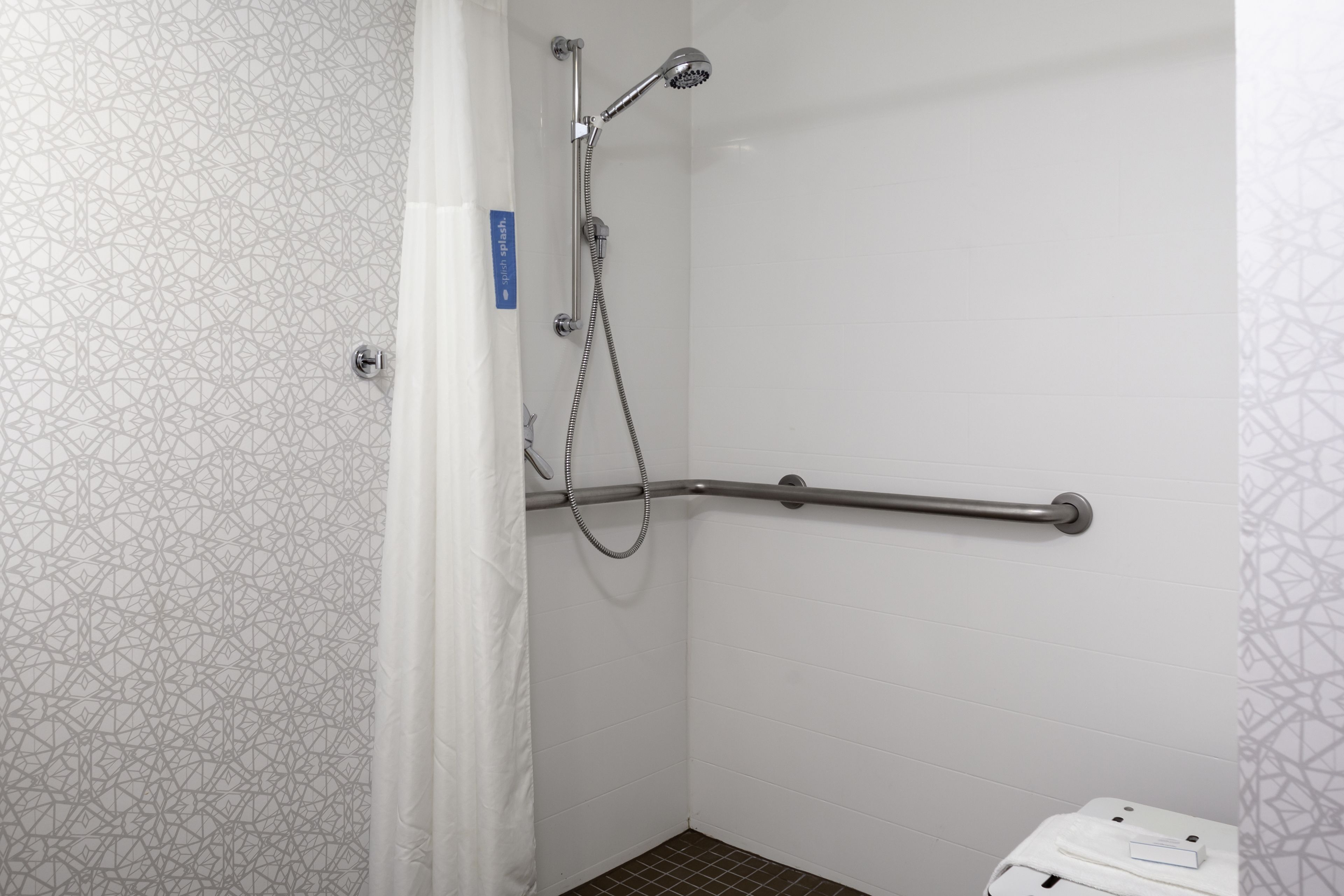 combined shower/bathtub, free toiletries, hair dryer, towels