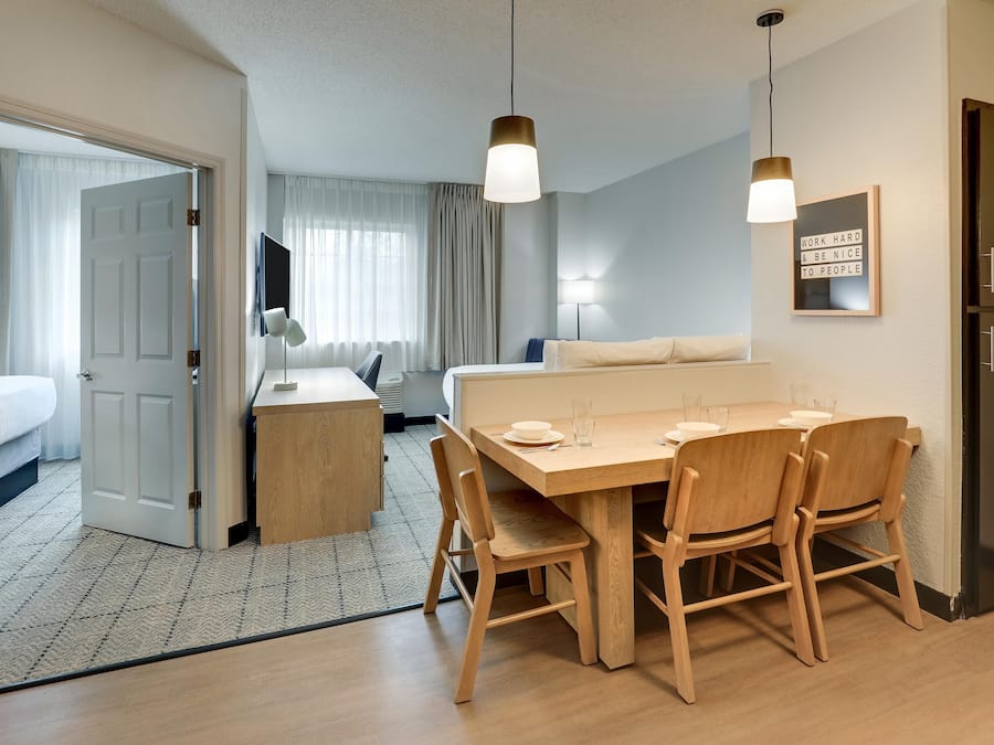 Suite, 2 Queen Beds (One Bedroom) | Desk, laptop workspace, blackout drapes, iron/ironing board