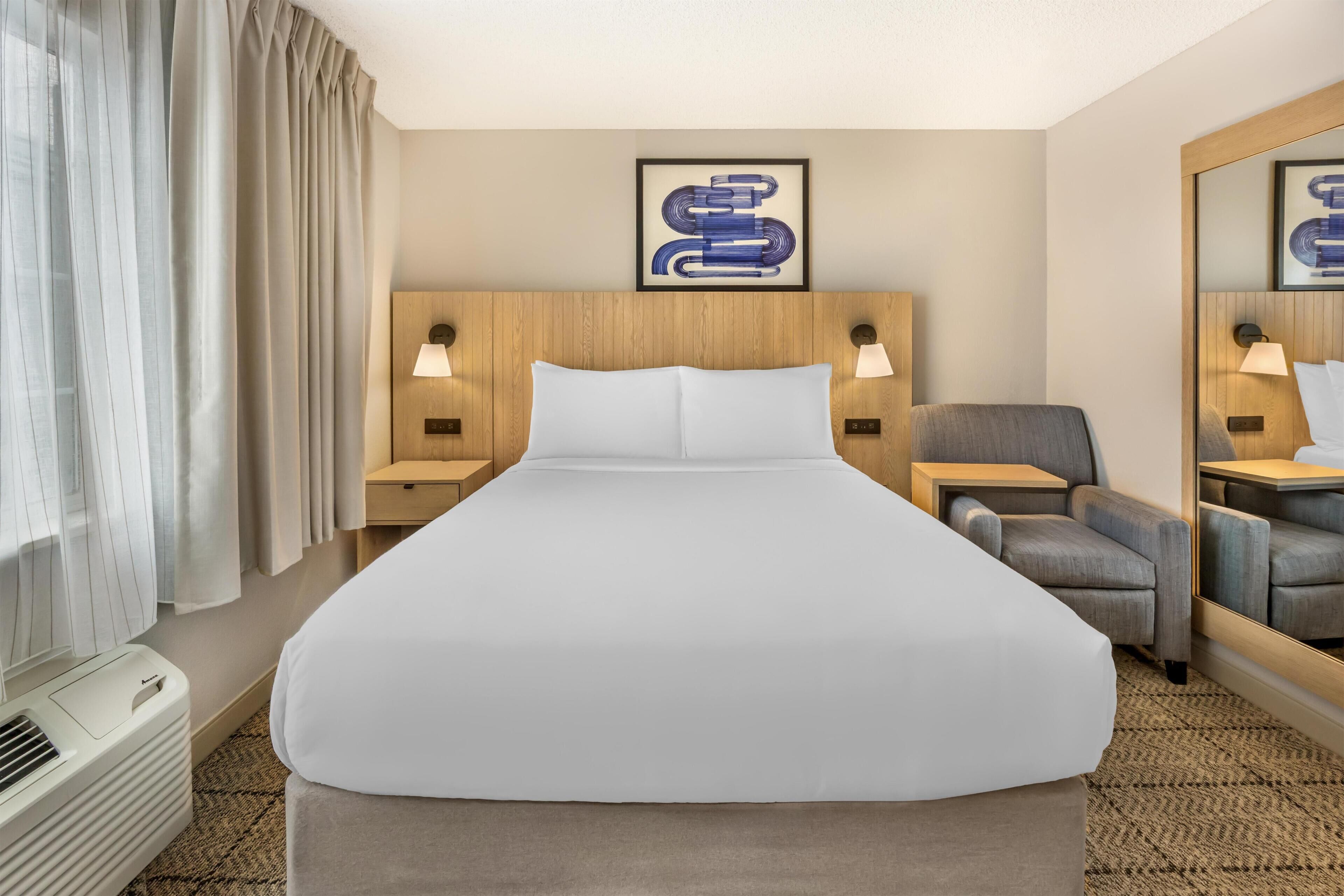 Studio Suite, 1 Queen Bed (Studio) | Desk, laptop workspace, blackout curtains, iron/ironing board