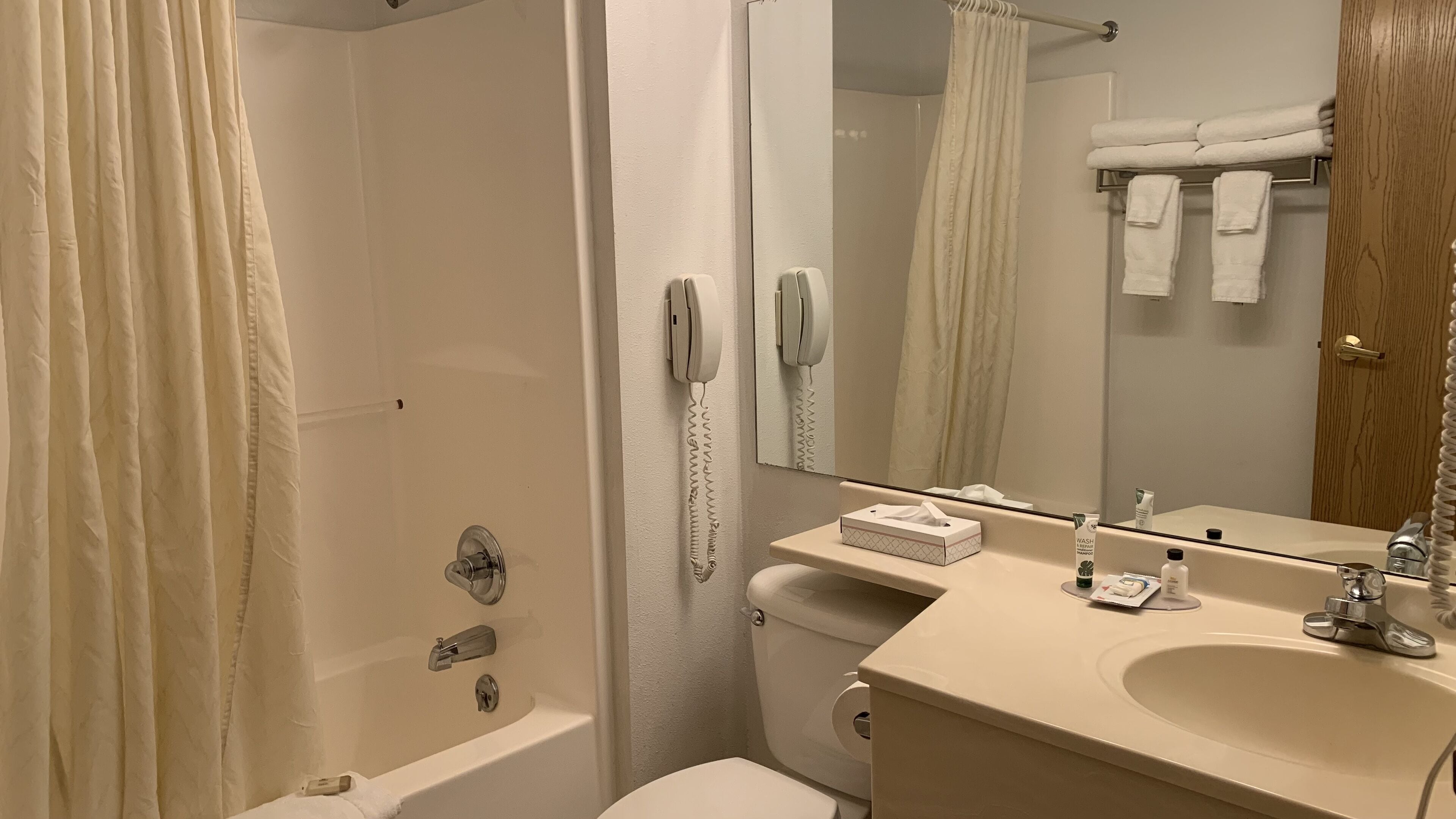 combined shower/bathtub, free toiletries, hair dryer, towels