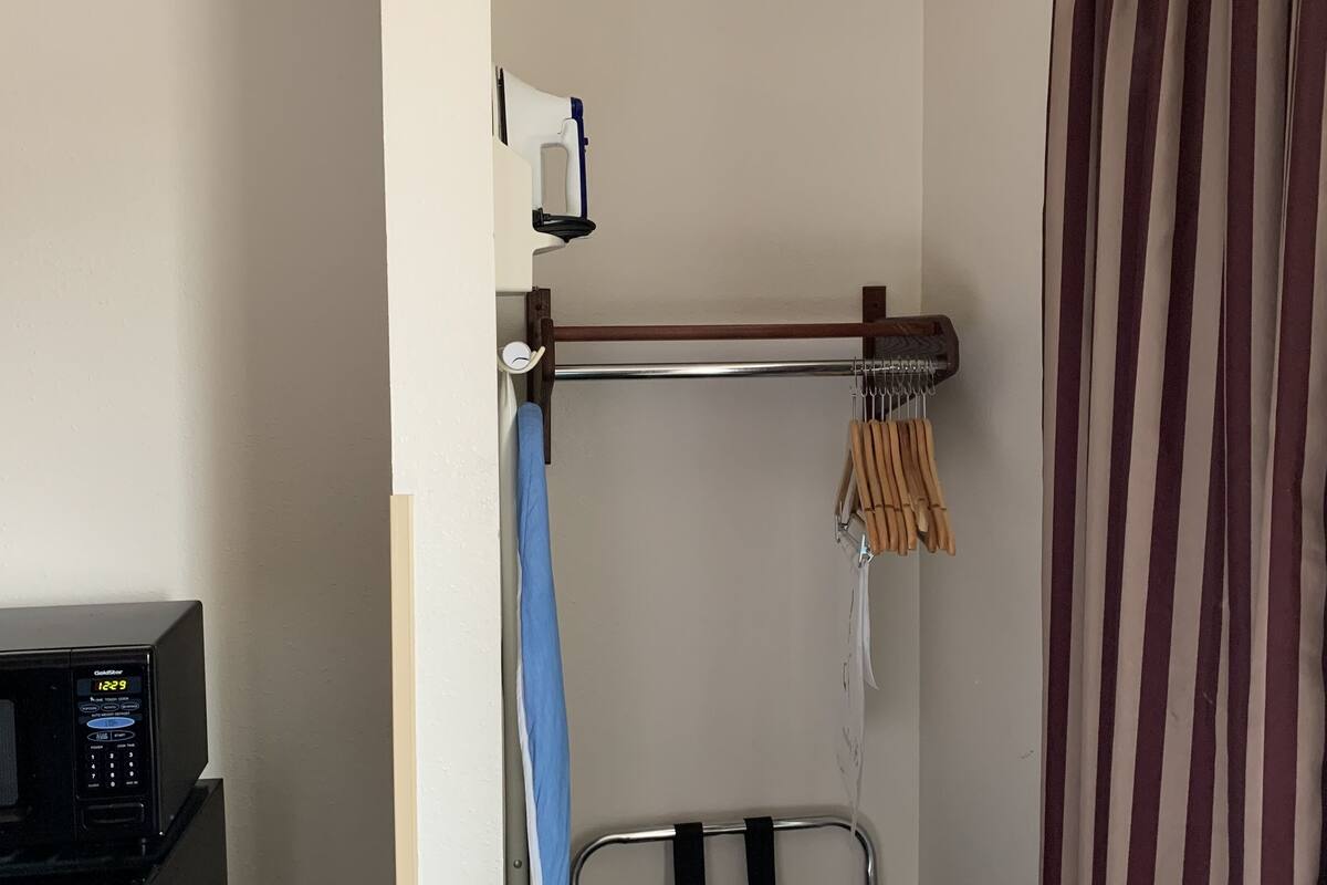 deluxe studio, 1 king bed, jetted tub | iron/ironing board