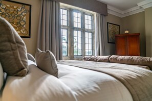 Luxe beddengoed, een kluis op de kamer, individueel gedecoreerd