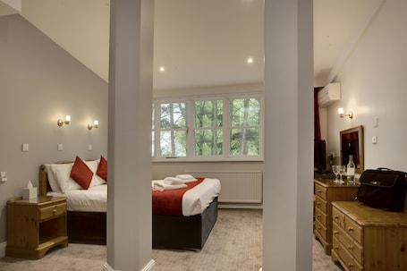 Desk, iron/ironing board, cribs/infant beds, free rollaway beds