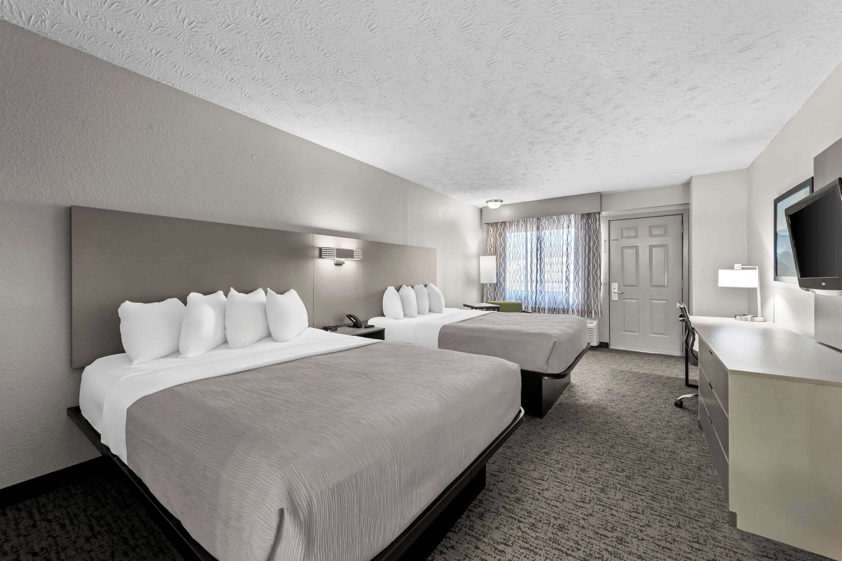 standard room, 2 queen beds, non smoking | in-room safe, individually decorated, individually furnished, desk