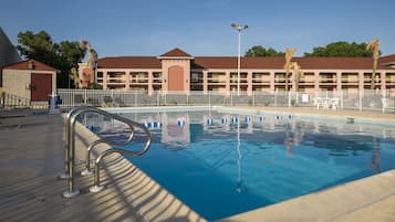 Seasonal outdoor pool, pool loungers