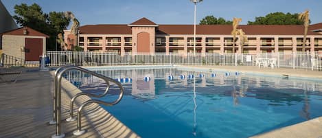 Seasonal outdoor pool, pool loungers