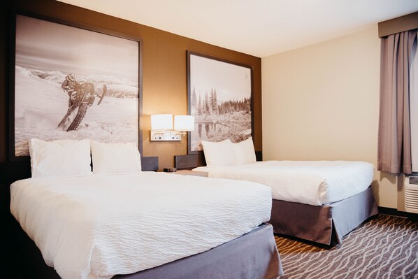 Suite, Multiple Beds, Non Smoking (One-Bedroom) | Desk, free cribs/infant beds, rollaway beds, free WiFi