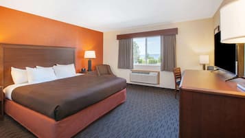 Room, 1 King Bed, Non Smoking | Desk, laptop workspace, blackout drapes, iron/ironing board