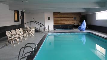 Indoor pool, open 6 AM to 10 PM, pool loungers