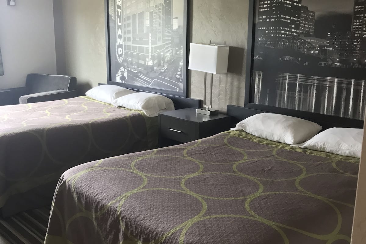 standard room, 2 queen beds, non smoking | in-room safe, desk, iron/ironing board, free cots/infant beds