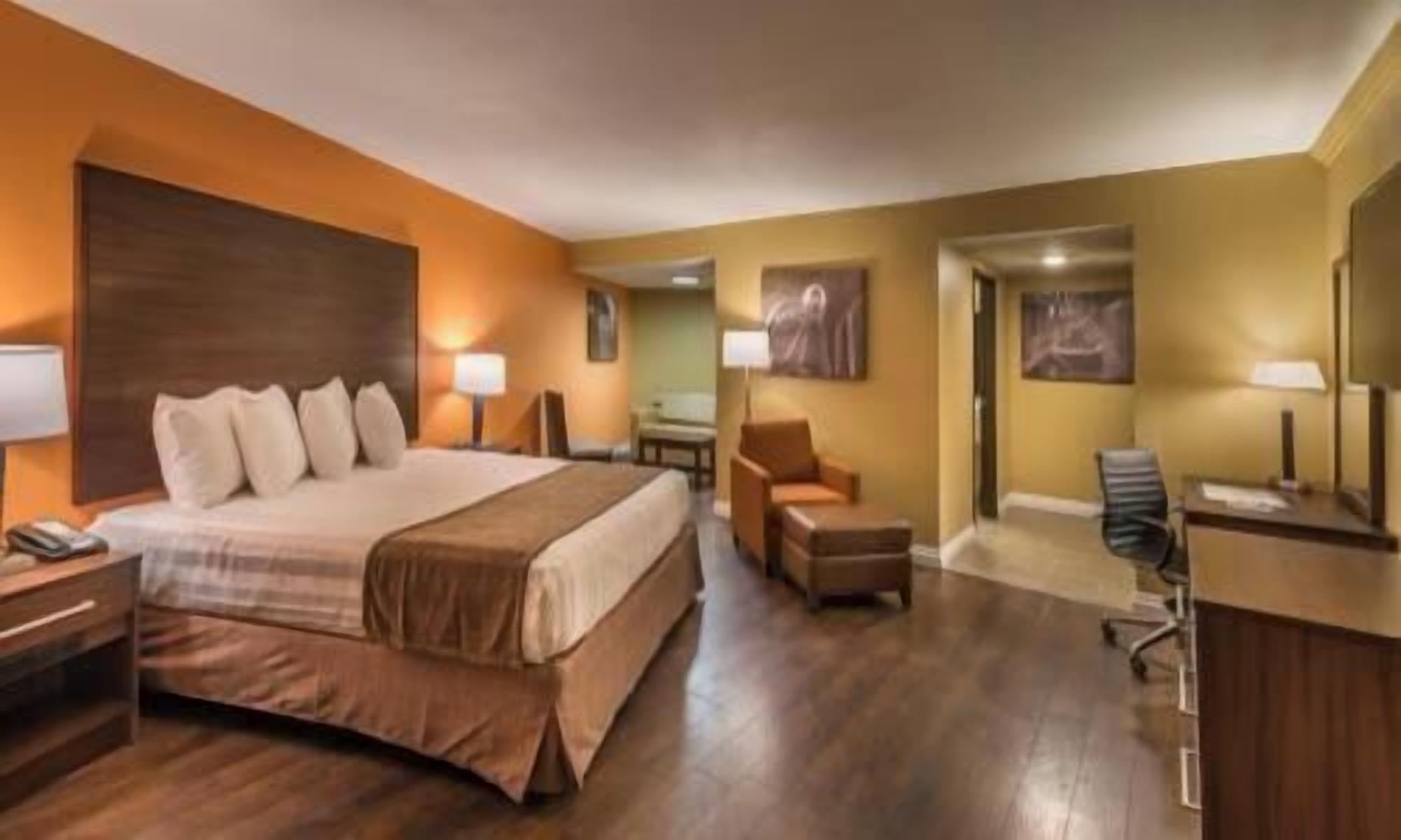 Pillowtop beds, desk, blackout drapes, iron/ironing board