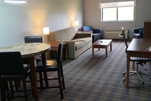 Suite, 1 King Bed, Non Smoking | Individually decorated, individually furnished, desk, laptop workspace