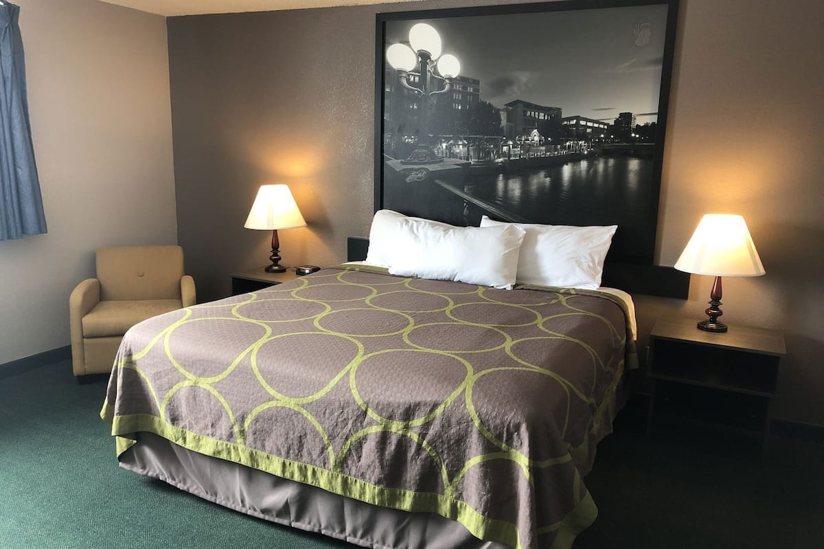 Hypo-allergenic bedding, desk, iron/ironing board, rollaway beds