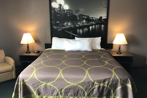 Hypo-allergenic bedding, desk, iron/ironing board, rollaway beds