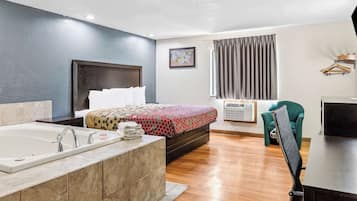 Suite, 1 King Bed, Non Smoking | In-room safe, desk, blackout drapes, rollaway beds