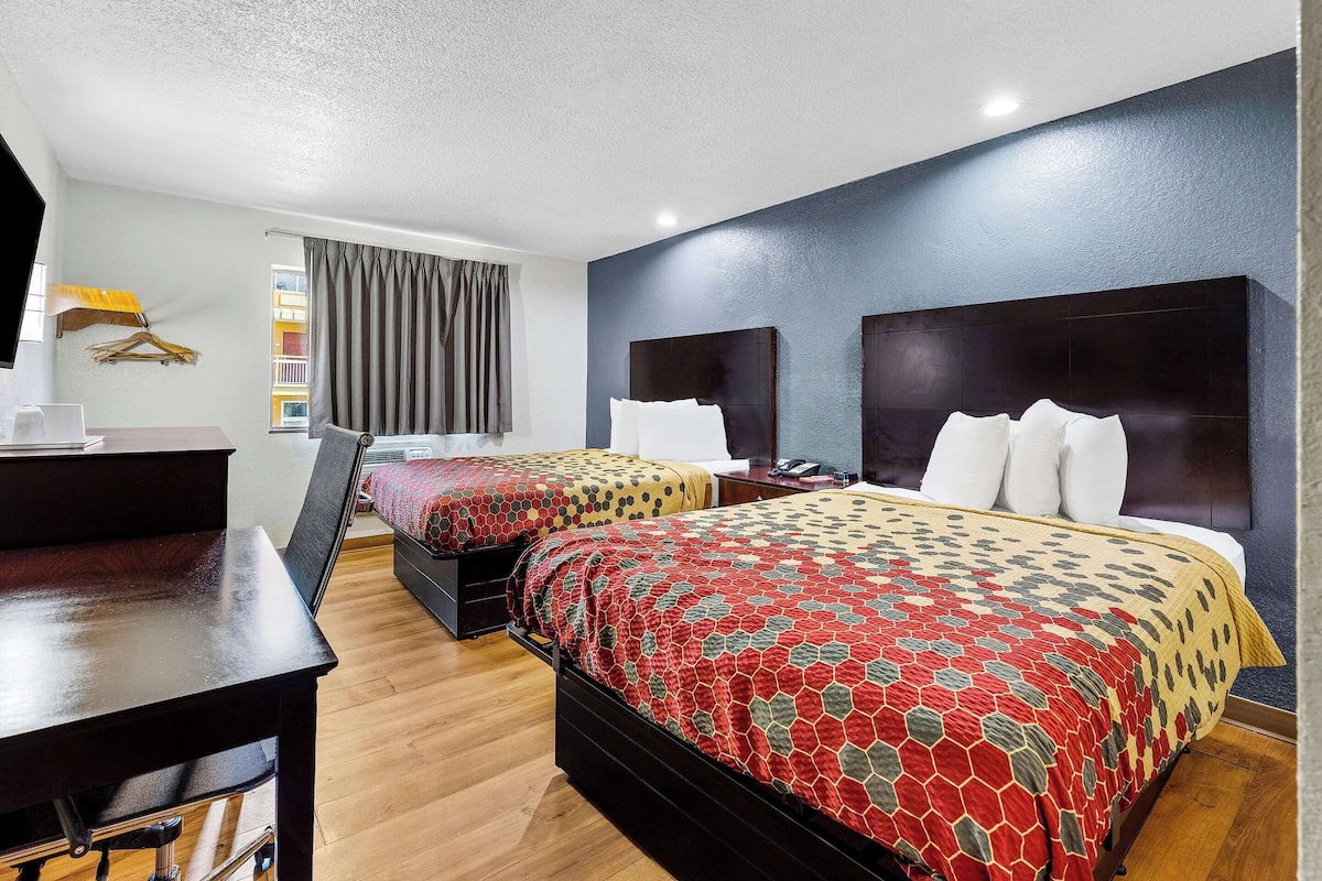 Room, 2 Queen Beds, Non Smoking | In-room safe, desk, blackout drapes, rollaway beds