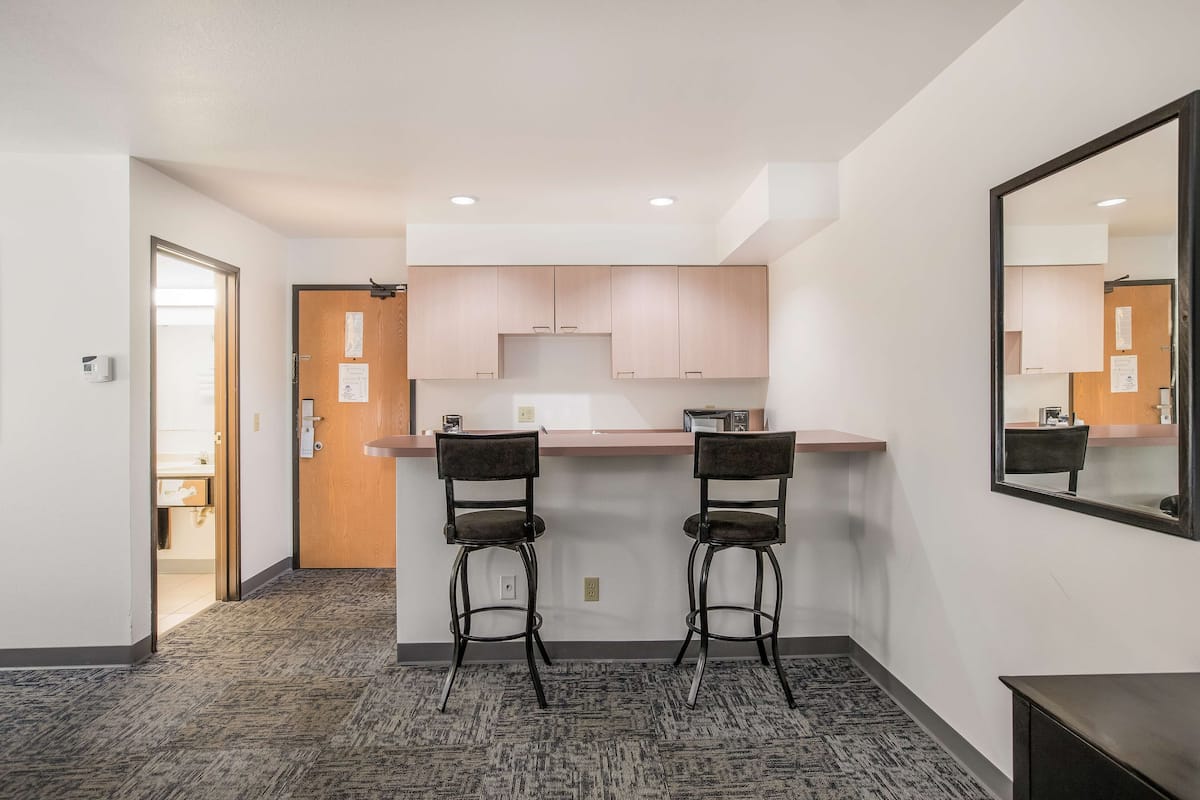 Suite, 1 King Bed, Non Smoking (2nd Floor) | Desk, iron/ironing board, free cribs/infant beds, rollaway beds