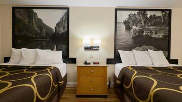 Desk, blackout drapes, iron/ironing board, rollaway beds