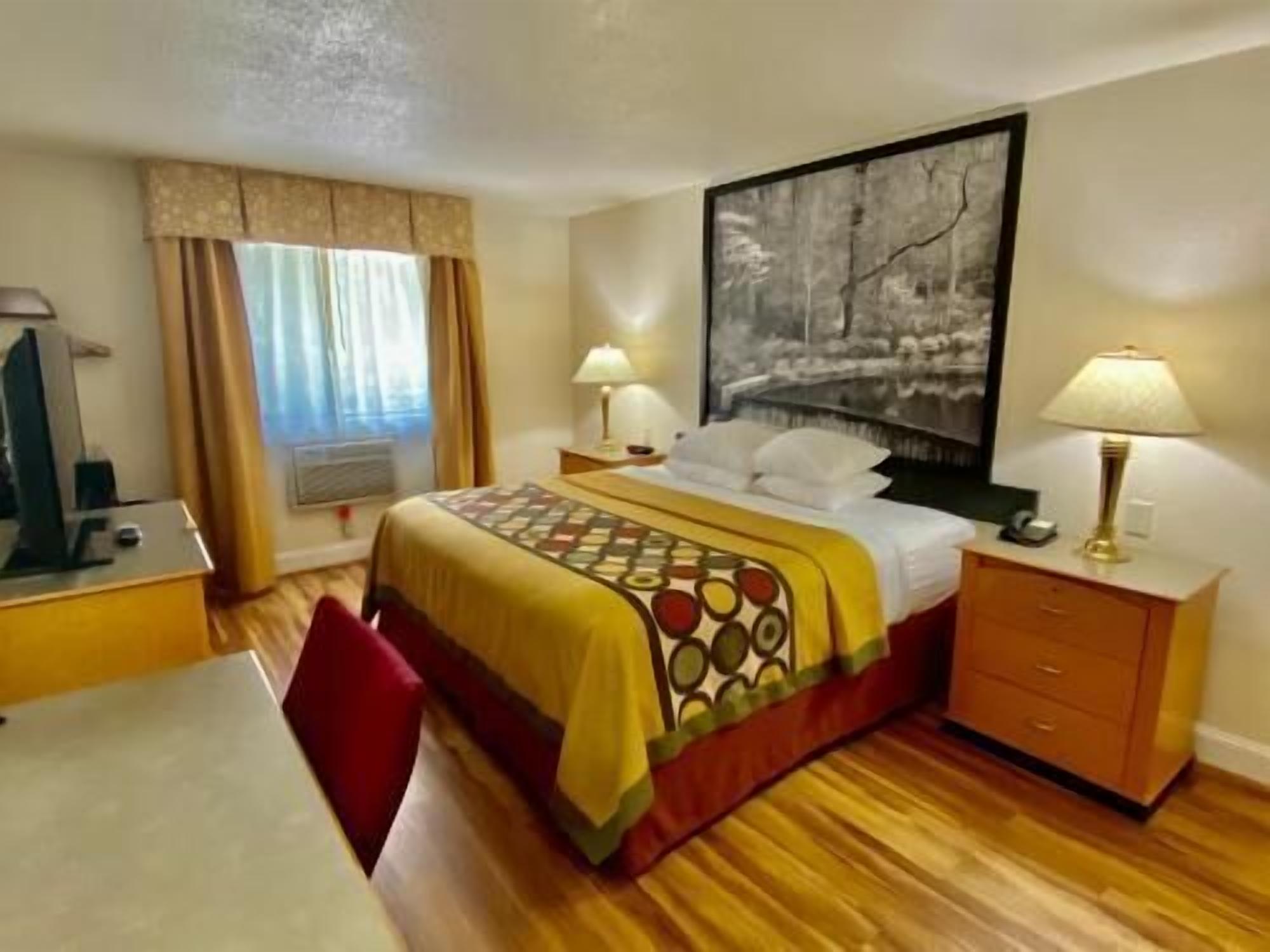 Desk, blackout drapes, iron/ironing board, rollaway beds