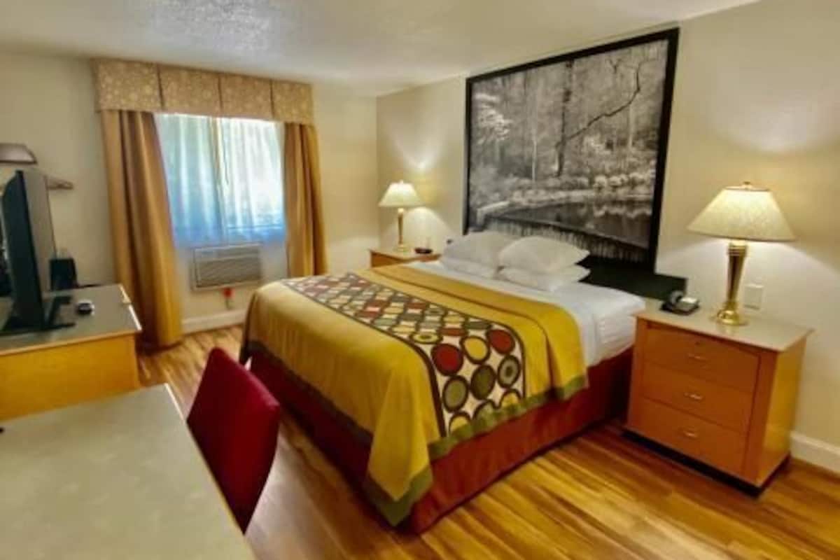 Desk, blackout drapes, iron/ironing board, rollaway beds