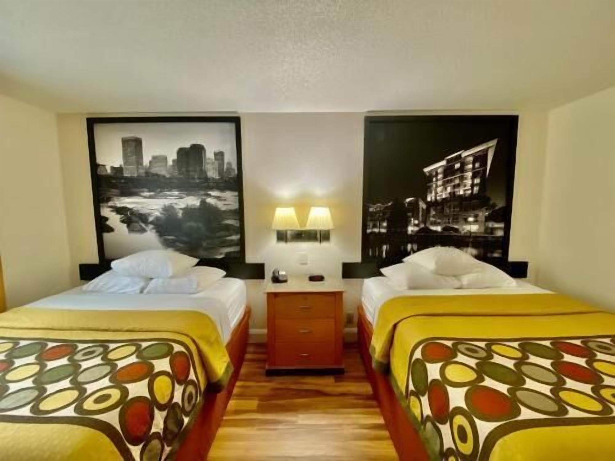 Desk, blackout drapes, iron/ironing board, rollaway beds