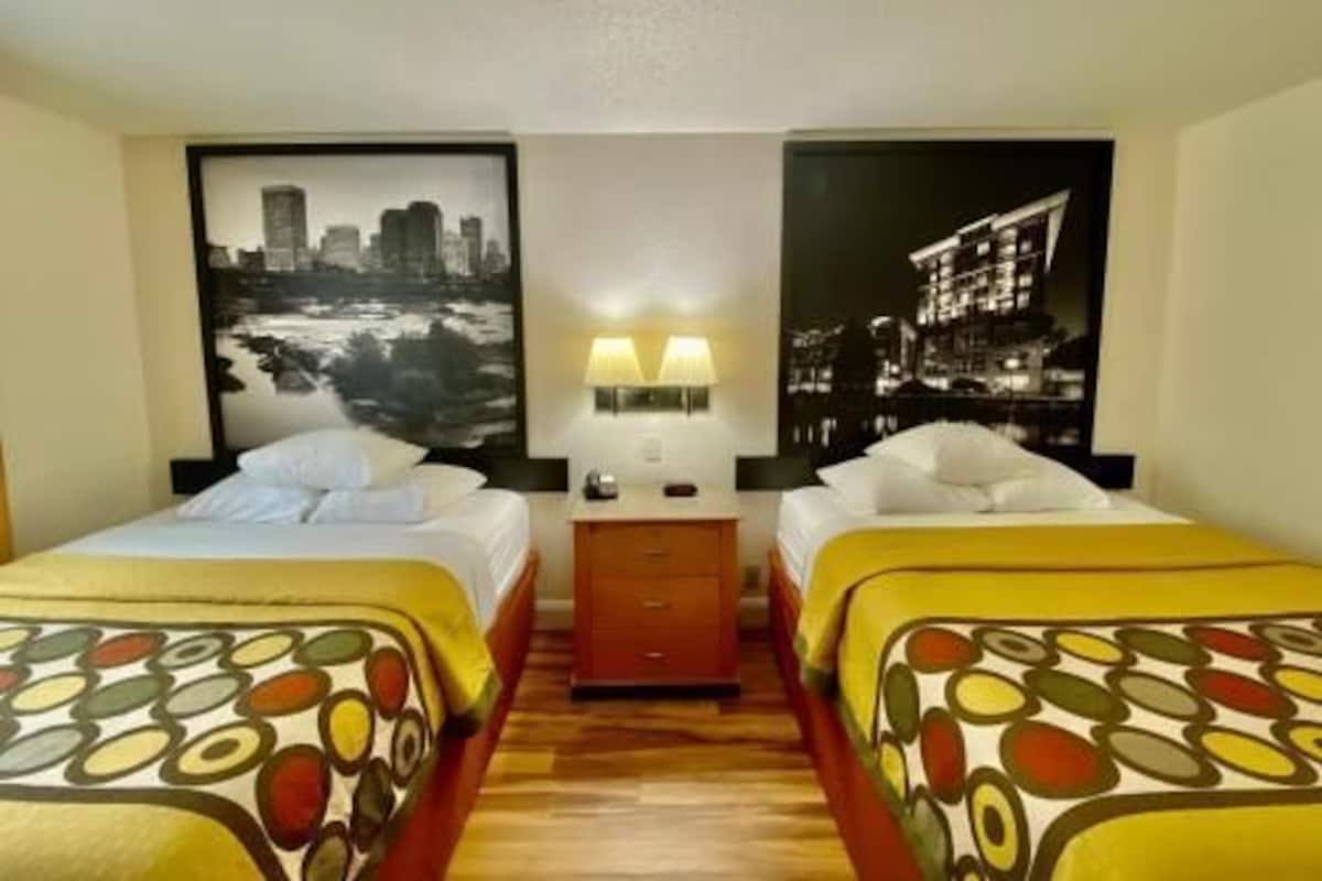 Desk, blackout drapes, iron/ironing board, rollaway beds