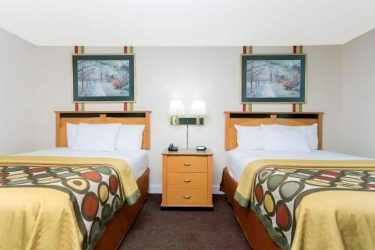 Desk, blackout drapes, iron/ironing board, rollaway beds