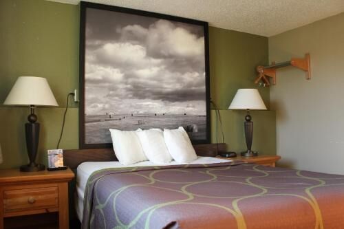Desk, blackout curtains, free cots/infant beds, free WiFi
