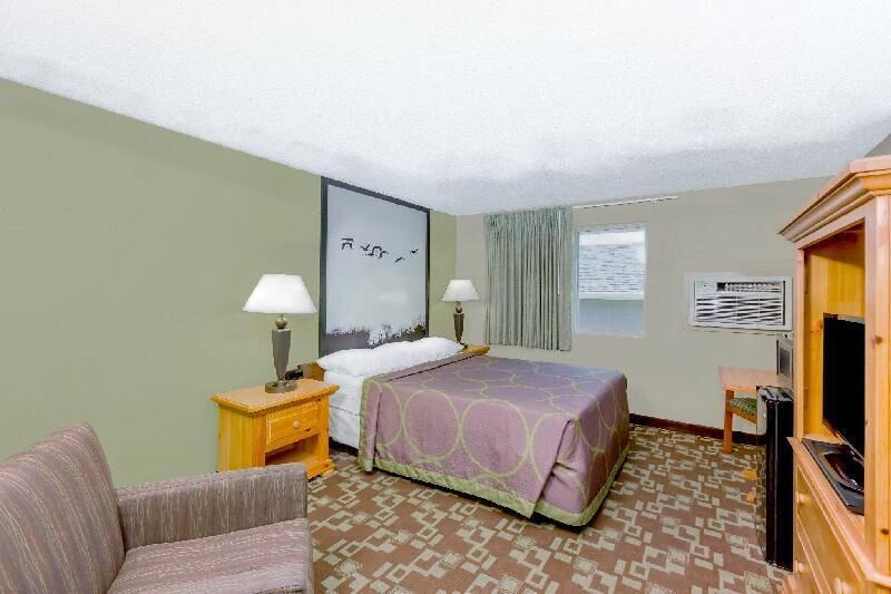 Desk, blackout curtains, free cots/infant beds, free WiFi