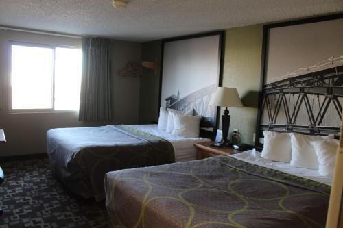 Desk, blackout curtains, free cots/infant beds, free WiFi