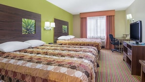 A hotel room with two beds, a desk, a television, and a window with curtains. - Super 8 by Wyndham Portales (Portales)