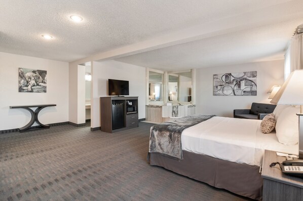 Suite, 1 King Bed, Non Smoking | Desk, blackout drapes, iron/ironing board, free cribs/infant beds