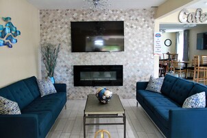 Televisión de pantalla plana, estación para iPod