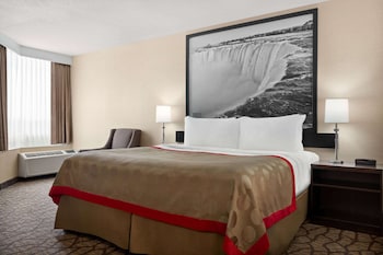 Desk, iron/ironing board, free cribs/infant beds, rollaway beds at Ramada by Wyndham Niagara Falls Near the Falls