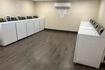 Laundry room at Ramada by Wyndham Niagara Falls Near the Falls