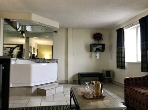 Suite, 1 King Bed, Hot Tub | In-room safe, desk, blackout drapes, free cribs/infant beds