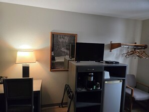 Desk, laptop workspace, blackout curtains, iron/ironing board