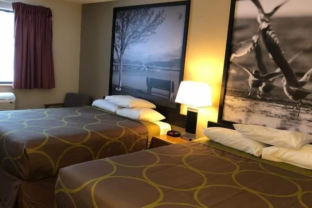 Desk, laptop workspace, blackout drapes, iron/ironing board