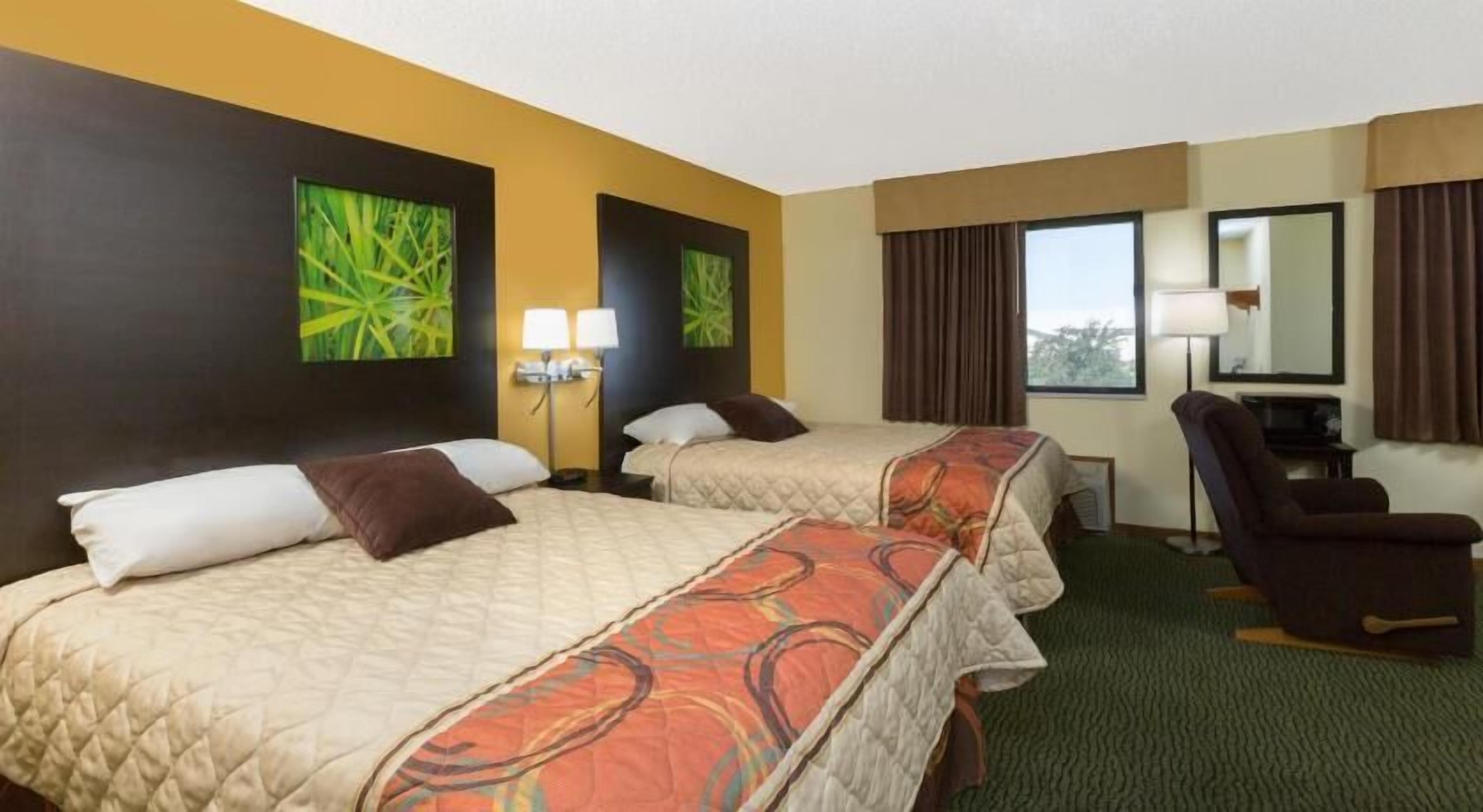 Desk, blackout drapes, iron/ironing board, free cribs/infant beds