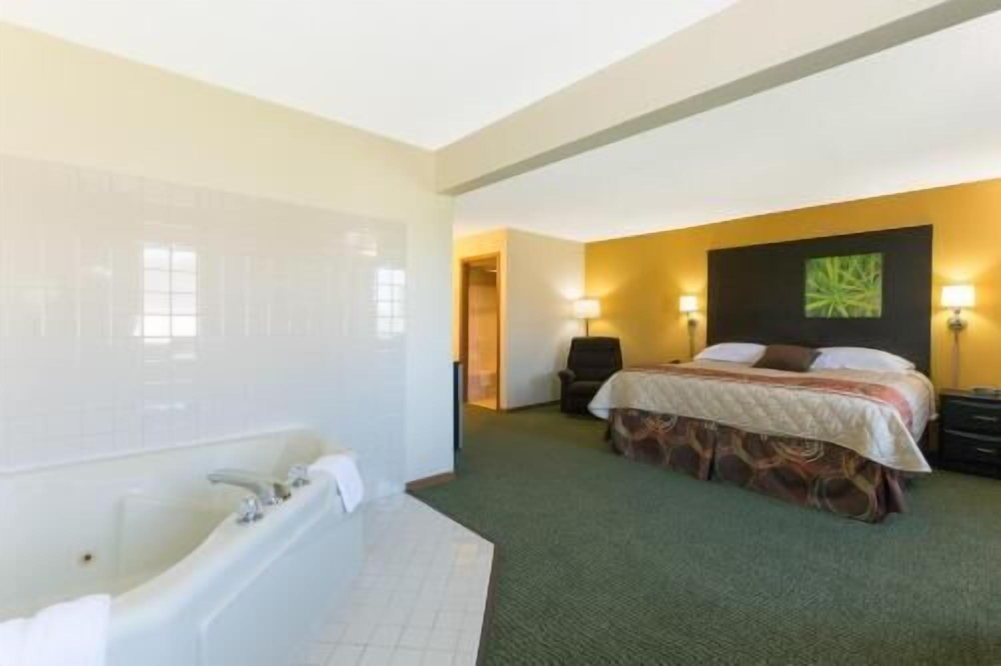 Desk, blackout drapes, iron/ironing board, free cribs/infant beds